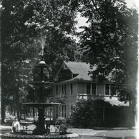 Chautauqua building near fountain in Forest Park