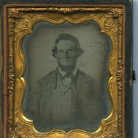 Ambrotype of an unidentified man holding a book