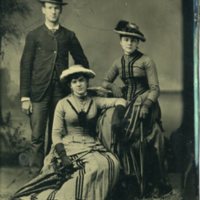 Tintype of an unidentified man, Ella Atkinson Brown, and Jennie Brown Frederick