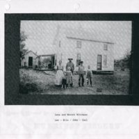 Wenzel and Lena Wittmann and their four children standing outside their home.